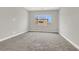 Spacious bedroom featuring natural light and neutral carpeting at 851 Klamath Springs St, Henderson, NV 89011