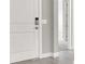 A bright white door leads into the home and features an electronic lock at 851 Klamath Springs St, Henderson, NV 89011