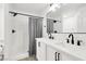 Bathroom boasts double sinks, framed mirror, and updated fixtures at 8524 Little Fox St, Las Vegas, NV 89123