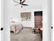 Cozy bedroom features neutral tones and a large window for natural light at 8524 Little Fox St, Las Vegas, NV 89123