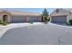 Charming single-story home featuring a tile roof, well-maintained landscaping, and a two-car garage at 8524 Little Fox St, Las Vegas, NV 89123