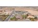 Wide aerial view of neighborhood with desert landscaping and tile roofed homes at 8610 Mohawk St, Las Vegas, NV 89139