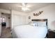 Inviting bedroom featuring a ceiling fan and closet with sliding doors at 8610 Mohawk St, Las Vegas, NV 89139