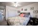 Cozy bedroom with closet, ceiling fan, and decorative pillows at 8610 Mohawk St, Las Vegas, NV 89139