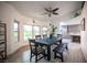 Bright dining room with tiled floors, natural light, and modern furnishings at 8610 Mohawk St, Las Vegas, NV 89139