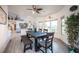 Comfortable dining room with bench seating and a ceiling fan at 8610 Mohawk St, Las Vegas, NV 89139