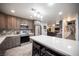 Well-appointed kitchen with island, stainless steel appliances, and ample counter space at 8610 Mohawk St, Las Vegas, NV 89139
