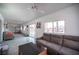 Spacious living room with sliding doors leading to the outdoor pool area at 8610 Mohawk St, Las Vegas, NV 89139
