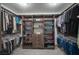 Well-organized walk-in closet offers ample storage for clothes and shoes at 8610 Mohawk St, Las Vegas, NV 89139