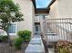 Condo stairway showcases modern design and well-maintained landscaping at 8985 S Durango Dr # 1033, Las Vegas, NV 89113