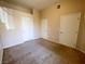 A blank canvas awaits in the neutral bedroom boasting three closets for storage at 8985 S Durango Dr # 1034, Las Vegas, NV 89113