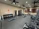Fitness center with a rack of dumbbells, weight machines, treadmills and open floor space at 8985 S Durango Dr # 1034, Las Vegas, NV 89113