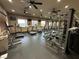 Community gym featuring cardio equipment, weight machines, mirrors and fans for a complete workout experience at 8985 S Durango Dr # 1034, Las Vegas, NV 89113