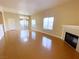 Spacious living room with bamboo flooring, fireplace and sliding door to patio at 8985 S Durango Dr # 1034, Las Vegas, NV 89113