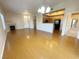 Open living space with bamboo floors, kitchen access and fireplace at 8985 S Durango Dr # 1034, Las Vegas, NV 89113