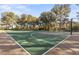 Community basketball court with full court layout and mature trees at 921 Granger Farm Way, Las Vegas, NV 89145