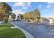 The grand entrance to Queensridge with immaculate landscaping, monuments, and secure entry points at 921 Granger Farm Way, Las Vegas, NV 89145