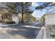 Elegant gated community entrance with decorative ironwork and lush landscaping at 921 Granger Farm Way, Las Vegas, NV 89145