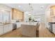 Modern kitchen with a large center island, stainless steel appliances, and ample cabinet space at 921 Granger Farm Way, Las Vegas, NV 89145