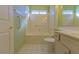 Bathroom featuring a tub, tile flooring, and vanity with double sinks at 9524 Quail Ridge Dr, Las Vegas, NV 89134
