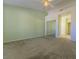 The main bedroom features a ceiling fan, carpet flooring and a sliding glass door closet at 9524 Quail Ridge Dr, Las Vegas, NV 89134
