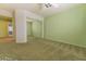 Bedroom with mirrored closet doors and light-green painted walls at 9524 Quail Ridge Dr, Las Vegas, NV 89134