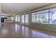 Sun-filled living room with a view to the kitchen, patio, and backyard at 9524 Quail Ridge Dr, Las Vegas, NV 89134