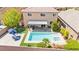 Aerial view of backyard featuring a sparkling pool and patio at 9588 Vital Crest St, Las Vegas, NV 89123