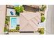 Private backyard showcasing a sparkling swimming pool, an adjacent patio area, and well-kept desert landscaping at 9588 Vital Crest St, Las Vegas, NV 89123