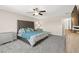 This bedroom boasts a comfortable bed, stylish furnishings, and plenty of space at 9588 Vital Crest St, Las Vegas, NV 89123