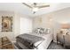 Bedroom featuring a large closet with sliding doors, mirror and decorative wall art at 9588 Vital Crest St, Las Vegas, NV 89123