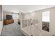 Upstairs loft with plush carpet, a ceiling fan, and a cozy seating area at 9588 Vital Crest St, Las Vegas, NV 89123