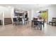 Dining room with tile floors, neutral paint and views into the kitchen at 9636 Salford Isle St, Las Vegas, NV 89123