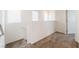 Bright hallway with carpet flooring, white walls and natural light at 9636 Salford Isle St, Las Vegas, NV 89123