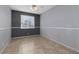 Bedroom with neutral tile floor, a ceiling fan, base molding and gray walls at 1709 Pacific Panorama Pl, Las Vegas, NV 89144