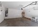 Spacious two car garage with cement flooring and lots of room for storage space at 1709 Pacific Panorama Pl, Las Vegas, NV 89144