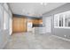 Bright and open kitchen area with tile floors, lots of cabinet space, and natural light from large windows at 1709 Pacific Panorama Pl, Las Vegas, NV 89144