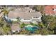 Aerial view showcases pool, patio, and tile roof of this beautiful property at 2338 Dolphin Ct, Henderson, NV 89074
