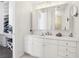 Bathroom vanity with lots of storage and shelves leading to walk-in closet at 2338 Dolphin Ct, Henderson, NV 89074