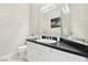 Modern bathroom featuring a vanity with black countertop and vessel sink at 2338 Dolphin Ct, Henderson, NV 89074