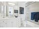 Bright bathroom featuring a modern vanity with ample storage and a shower-tub combo at 2338 Dolphin Ct, Henderson, NV 89074
