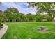 Expansive community park with picnic tables, a playground, and mature trees, ideal for outdoor activities at 2338 Dolphin Ct, Henderson, NV 89074