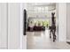 Grand foyer featuring high ceilings, elegant tile flooring, and an open view to the living area, creating a welcoming entrance at 2338 Dolphin Ct, Henderson, NV 89074
