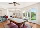 Bright game room with a pool table and access to the outdoor area at 2338 Dolphin Ct, Henderson, NV 89074