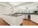 Modern kitchen with a large center island and stainless steel appliances at 2338 Dolphin Ct, Henderson, NV 89074