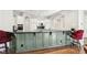 Bar area between kitchen and dining room with seating at 2338 Dolphin Ct, Henderson, NV 89074