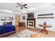 Spacious main bedroom with fireplace, TV, and ensuite bathroom at 2338 Dolphin Ct, Henderson, NV 89074