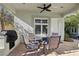 Cozy outdoor patio with a grill and dining set, perfect for alfresco dining and entertaining at 2338 Dolphin Ct, Henderson, NV 89074