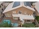 Aerial view of property featuring a swimming pool and well-maintained backyard with spiral staircase at 283 Grand Olympia Dr, Henderson, NV 89012