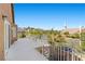 Balcony showcasing views of nearby homes, trees, and a church steeple at 283 Grand Olympia Dr, Henderson, NV 89012